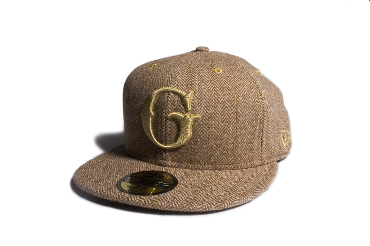 tan herringbone cap with gold G