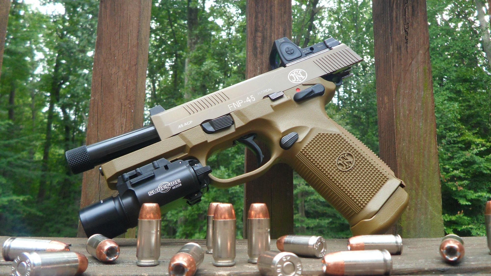 tan pistol with ammunition