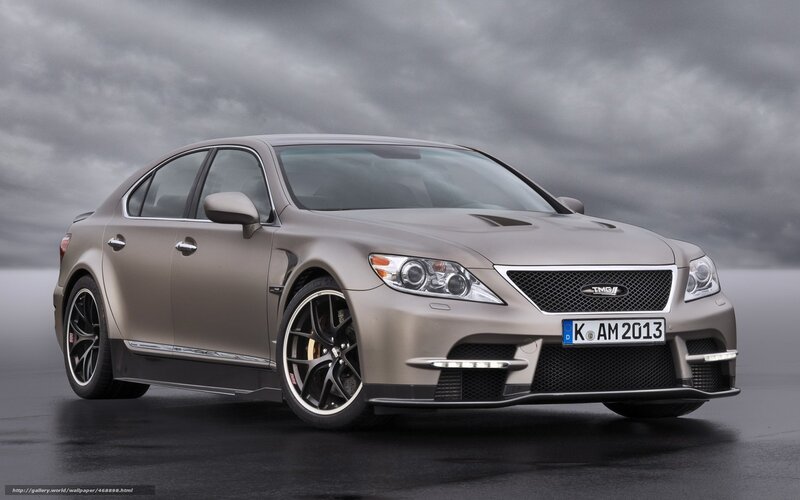 Tan sedan with custom modifications