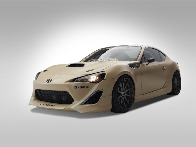 tan sports car with custom parts