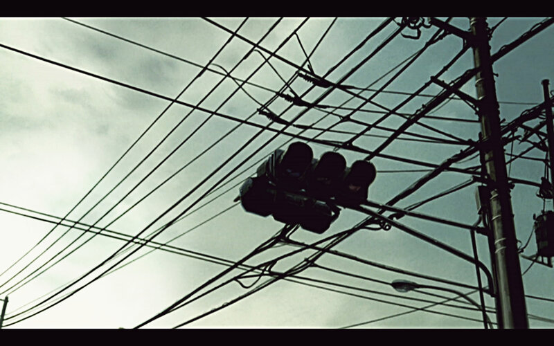 tangled wires and traffic light