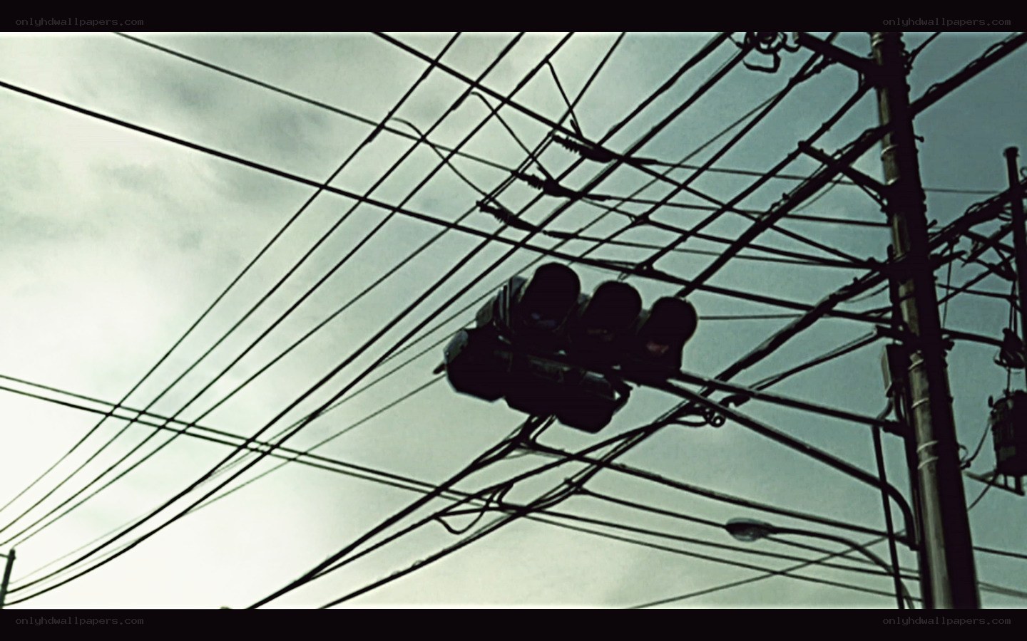tangled wires and traffic light
