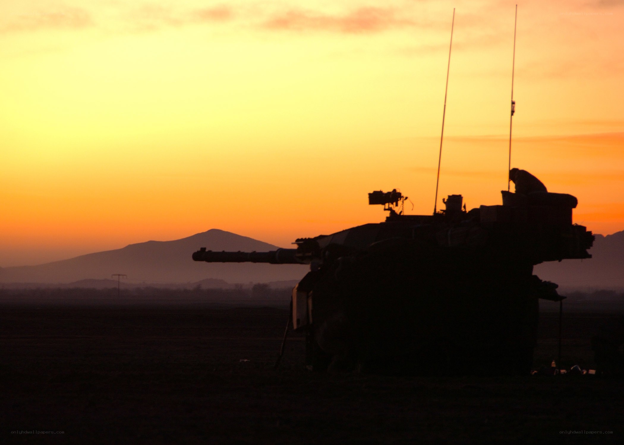 Tank at sunset silhouette
