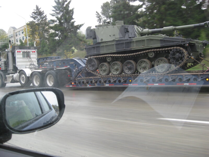 Tank being transported on a trailer