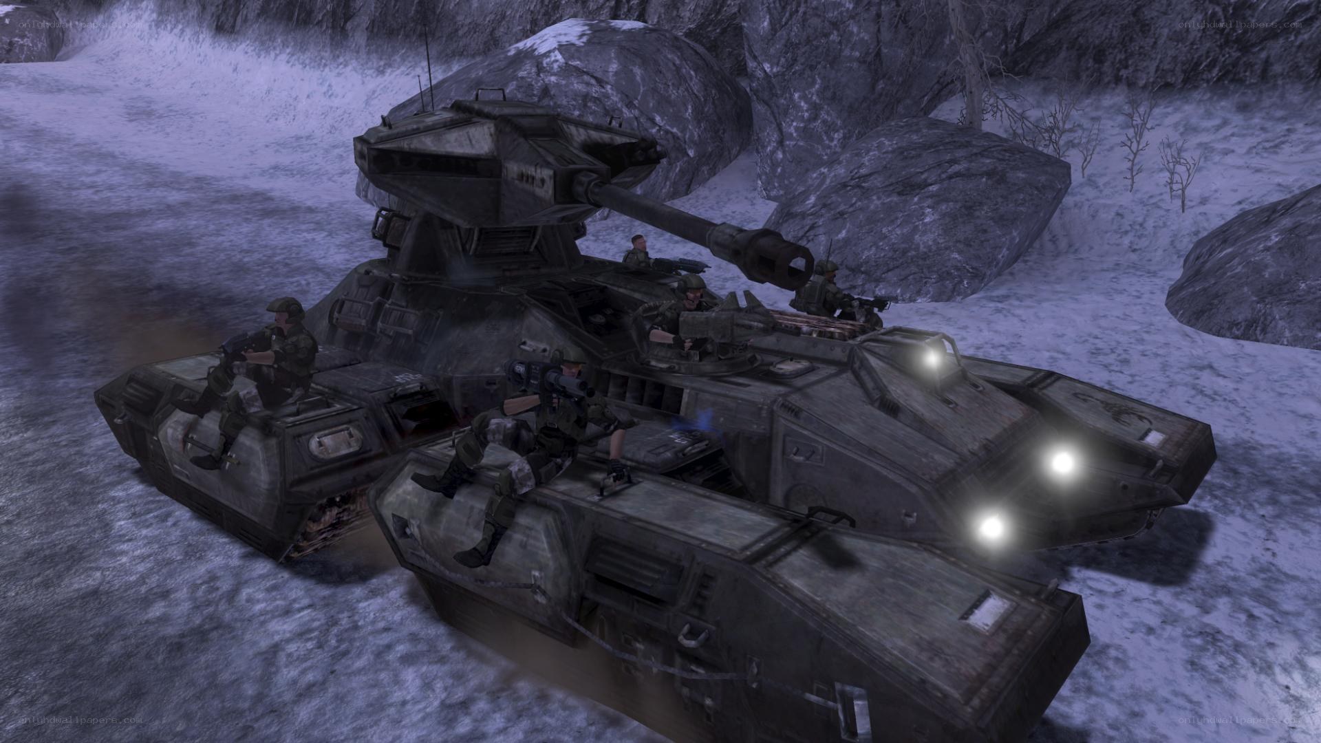tank convoy in snowy terrain