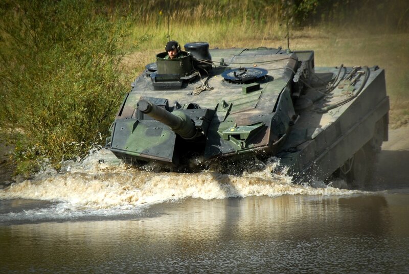 Tank Crossing River — Green, Dramatic, Afternoon, Photograph