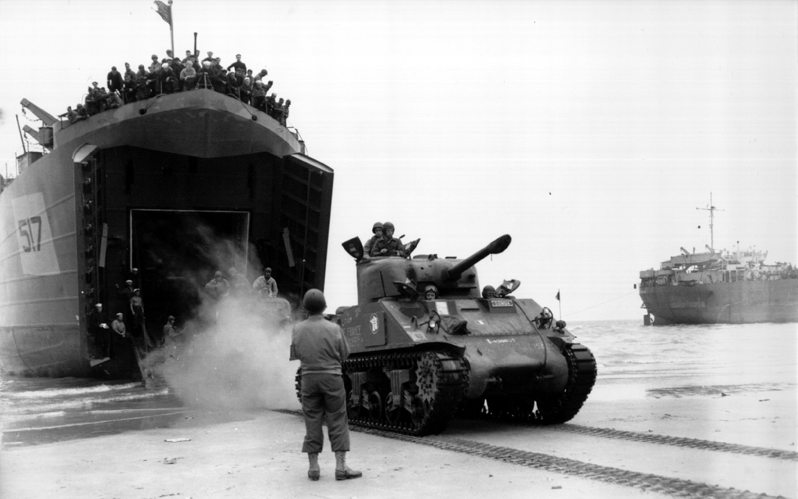 Tank disembarks from landing craft