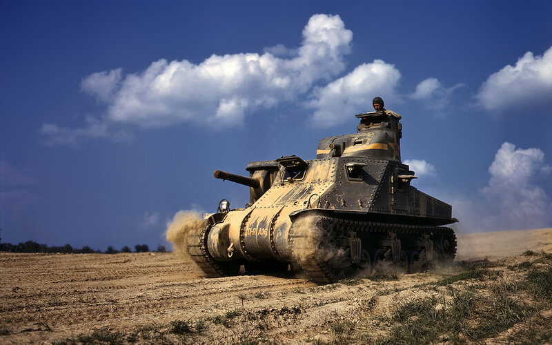 Tank in a dusty field