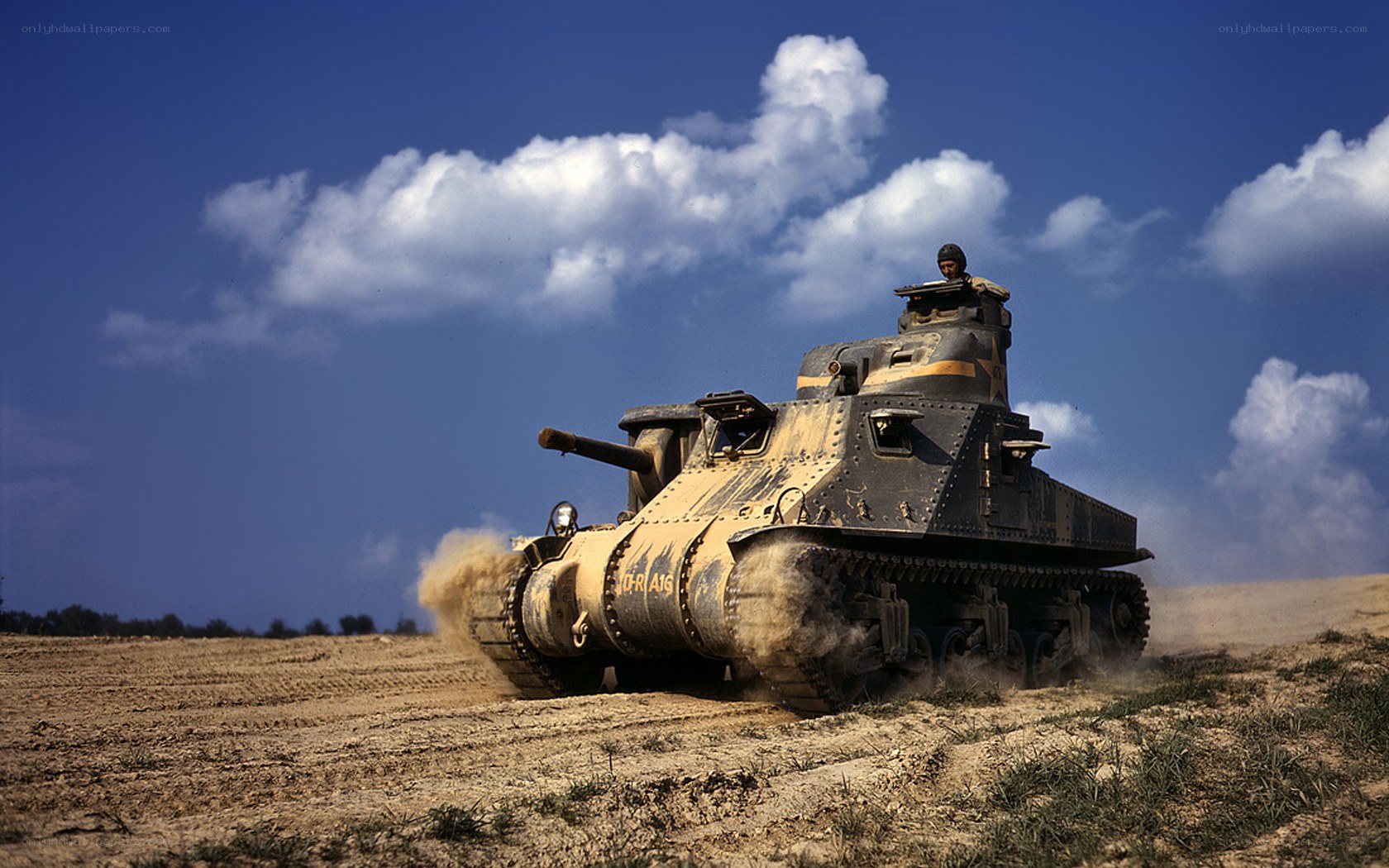 Tank in a dusty field