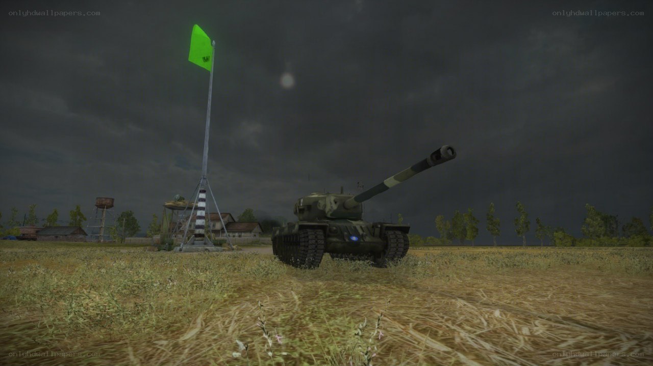 Tank in a field at dusk
