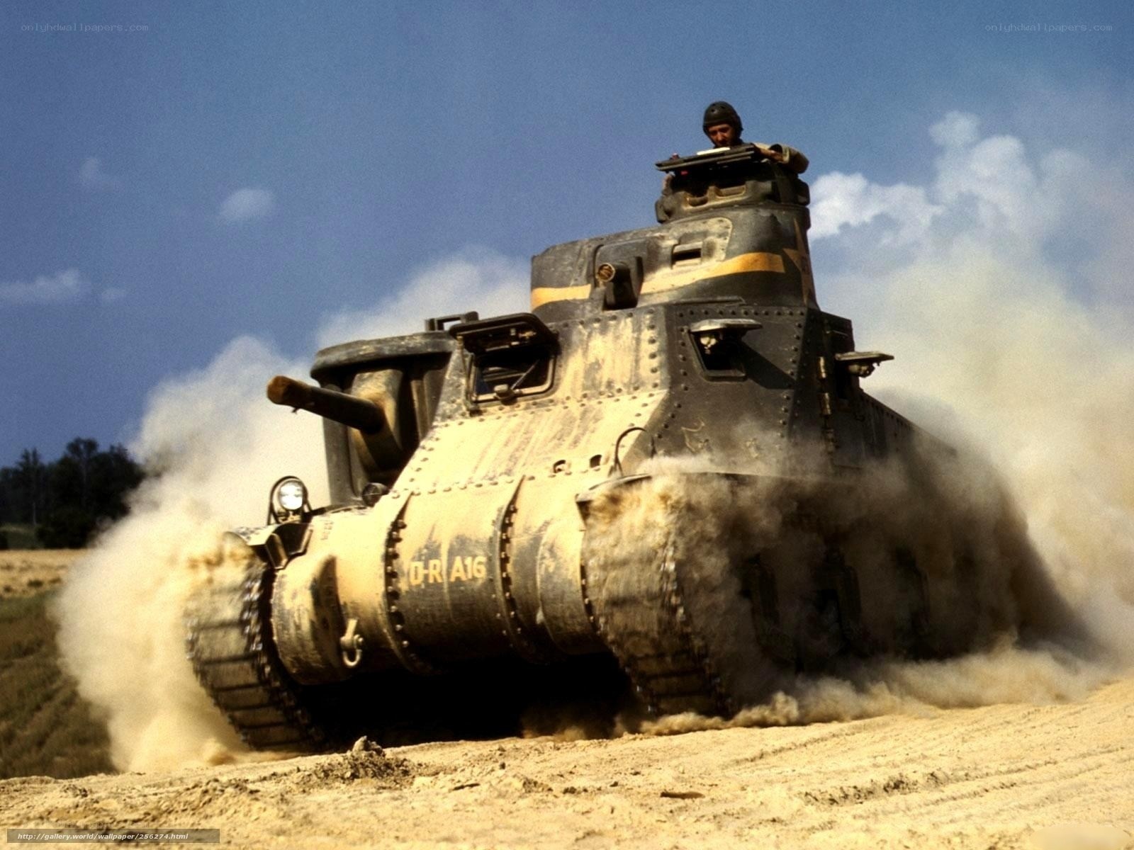Tank in action on dusty field