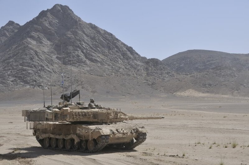 Tank in desert mountains