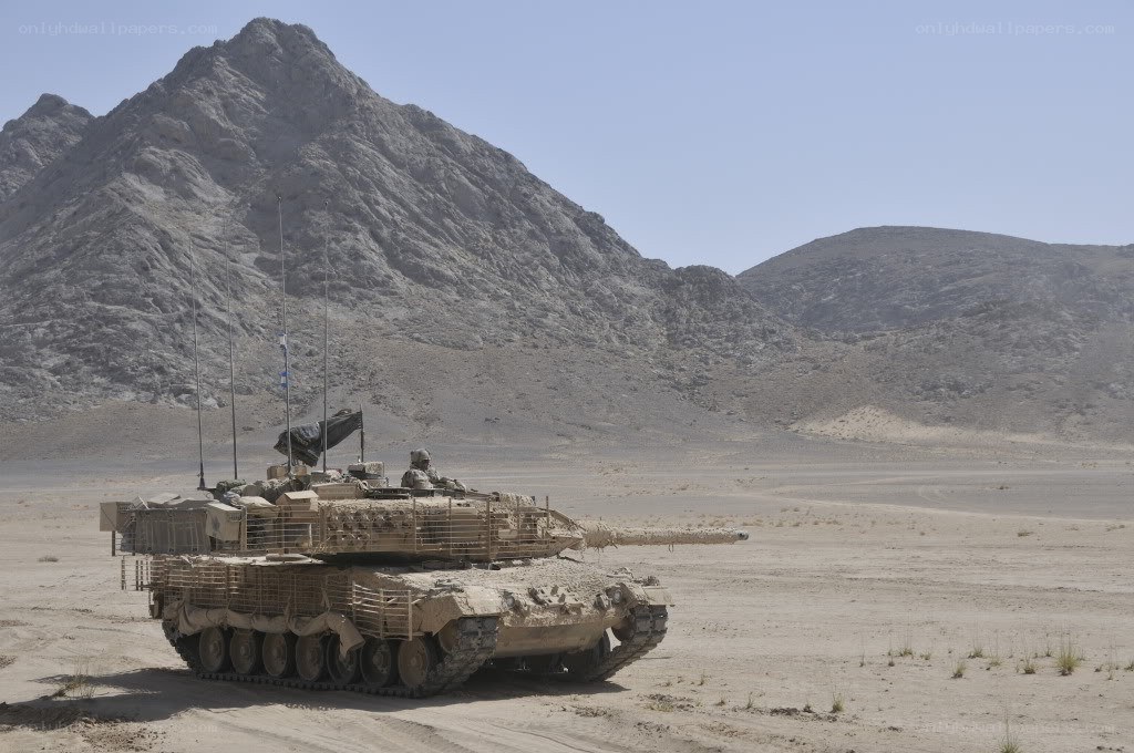 Tank in desert mountains