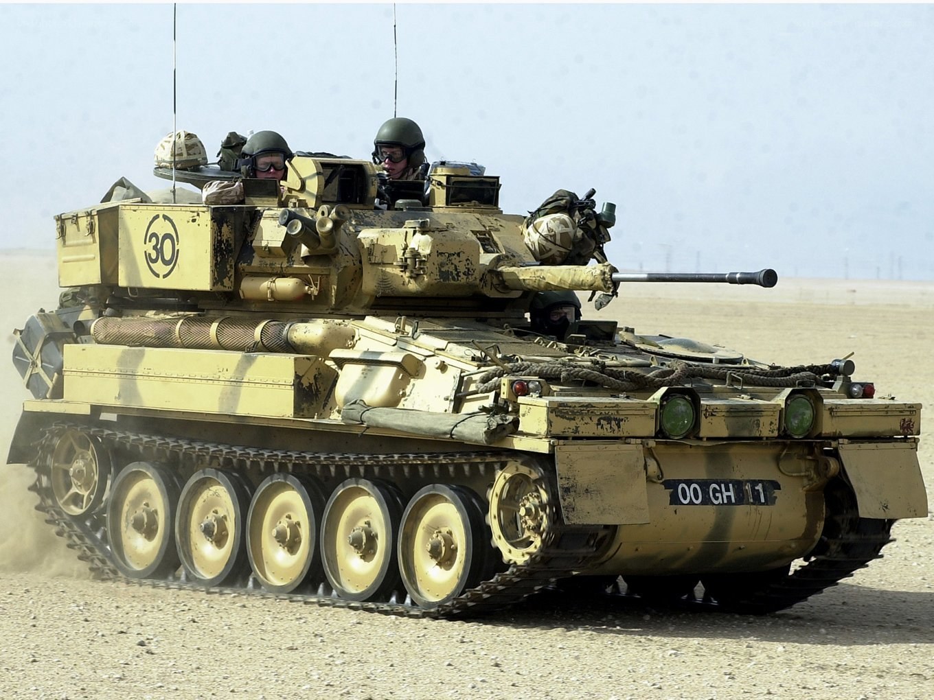 Tank in desert terrain