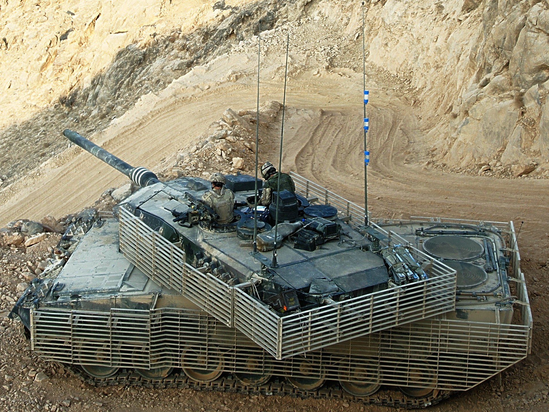 Tank in desert terrain