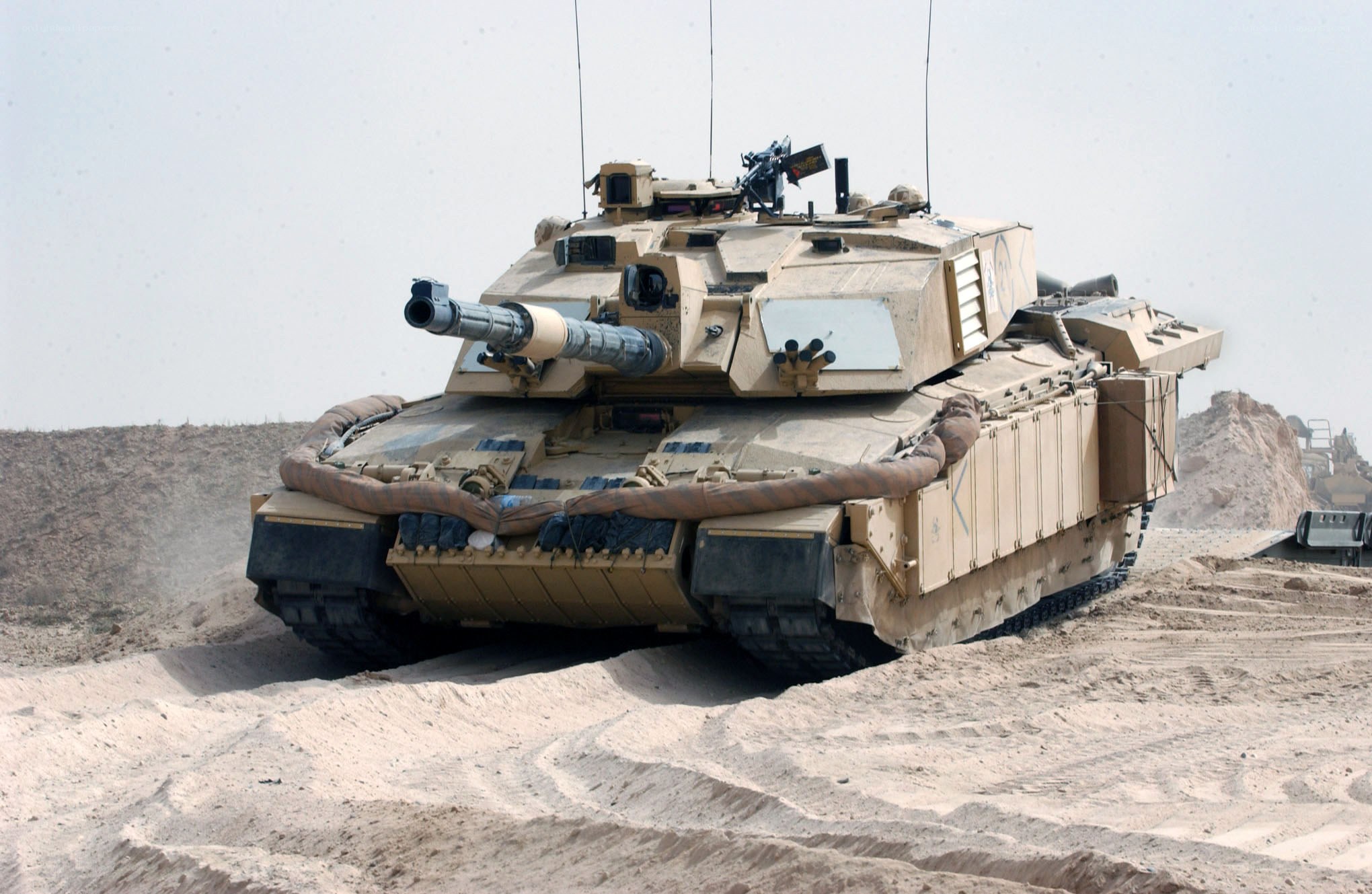 Tank in desert terrain
