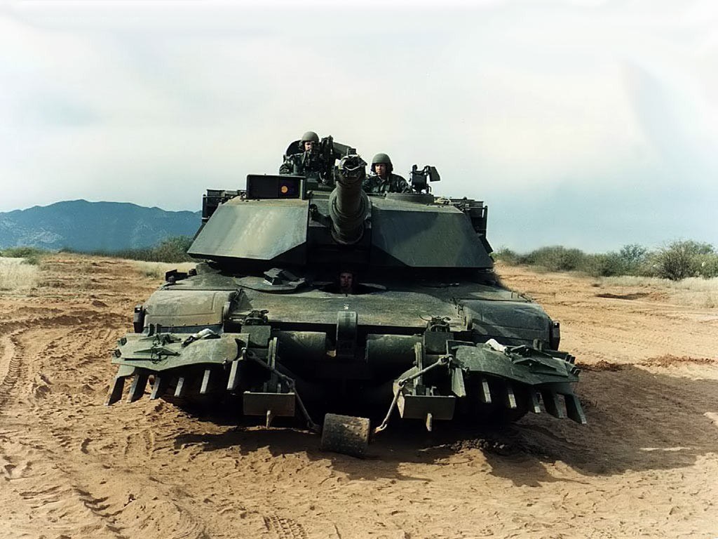 Tank in desert terrain