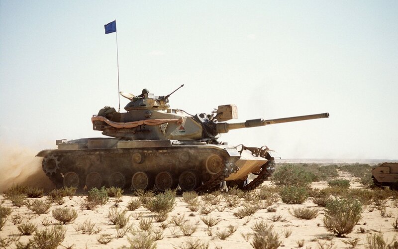 Tank in desert terrain