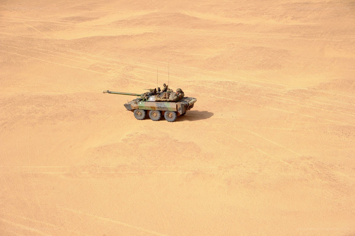 Tank in desert terrain