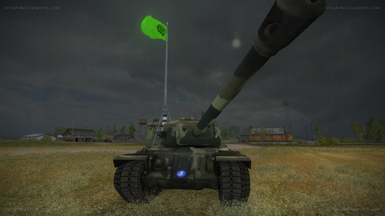 tank in field with green flag