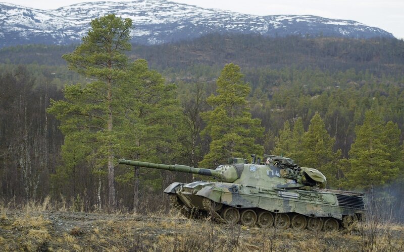 Tank in forested mountain area