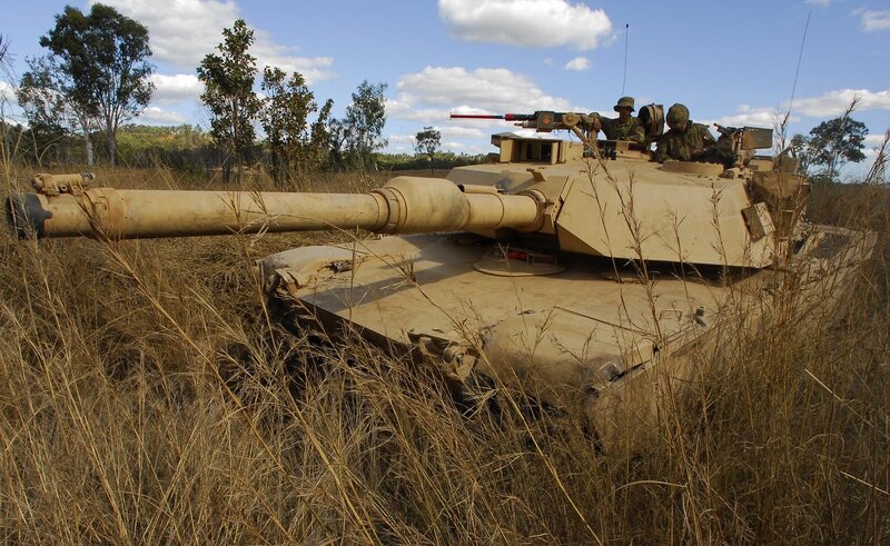 tank in grassy field