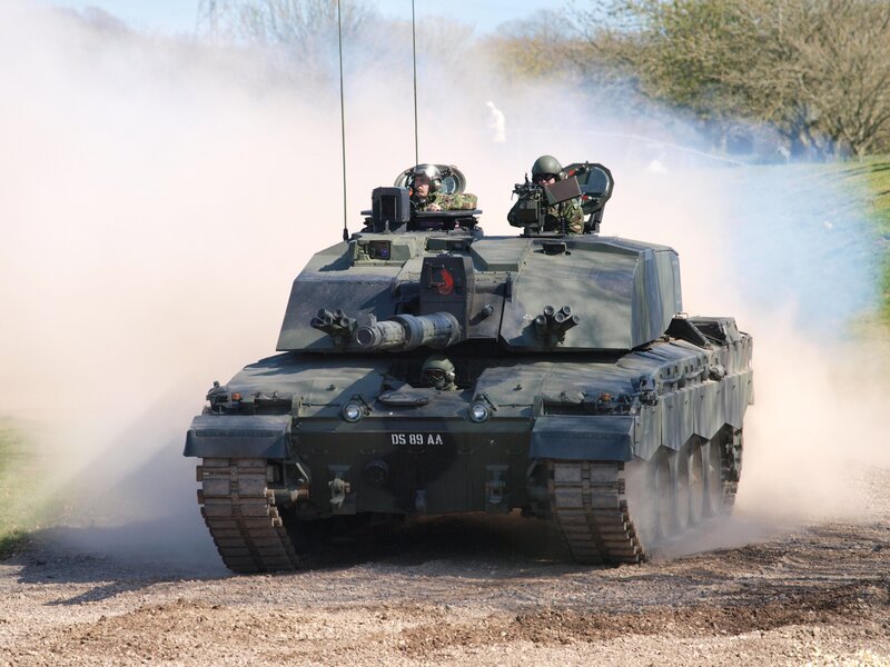 Tank in motion on dirt road