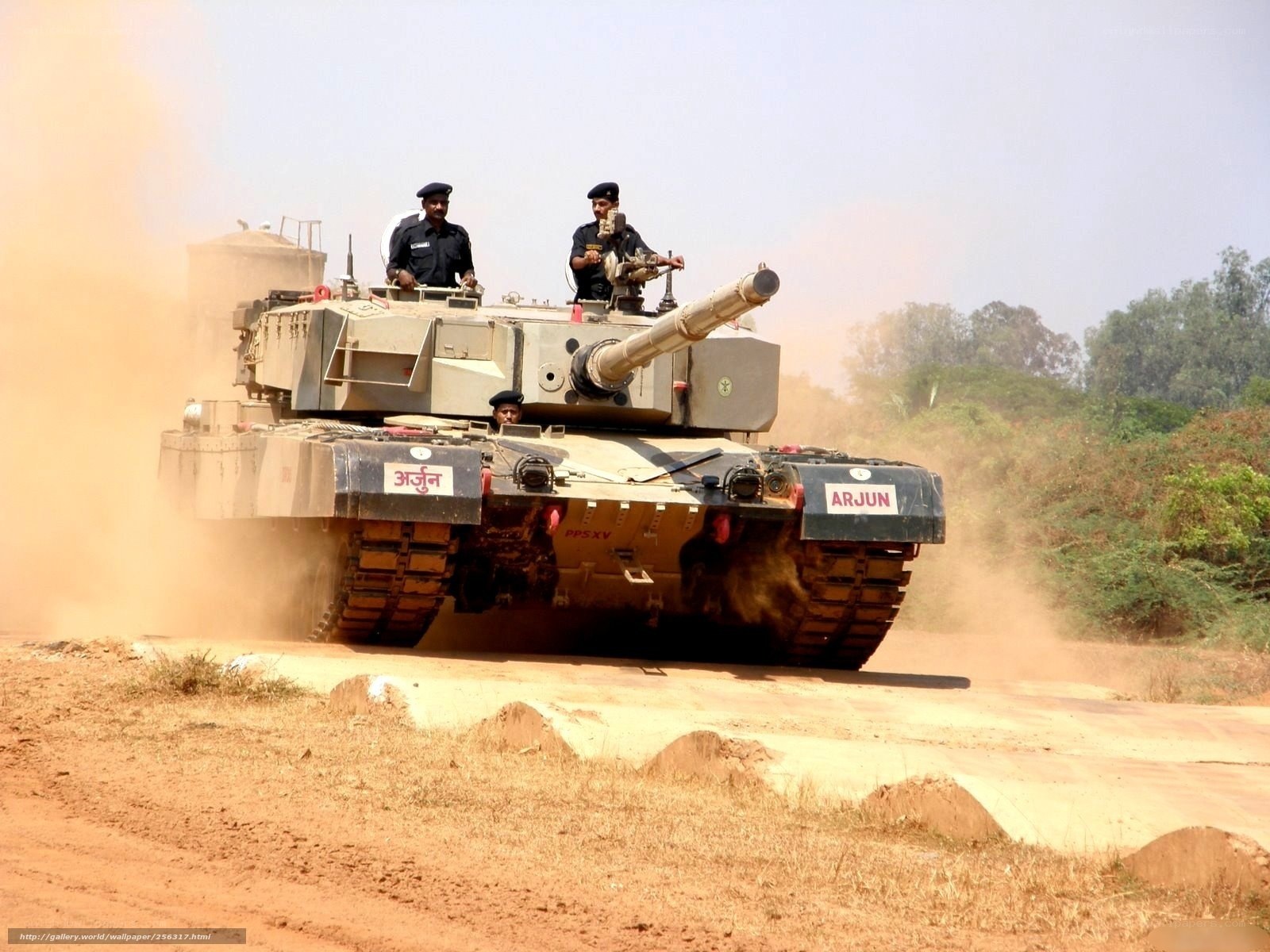 Tank in motion on dirt road