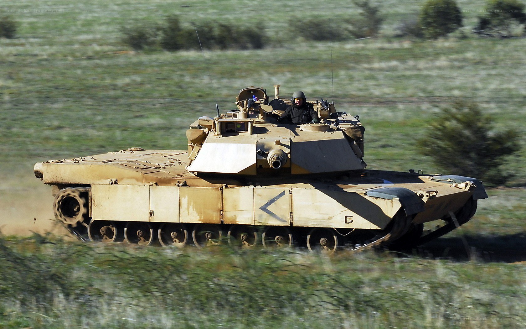 tank in motion on field