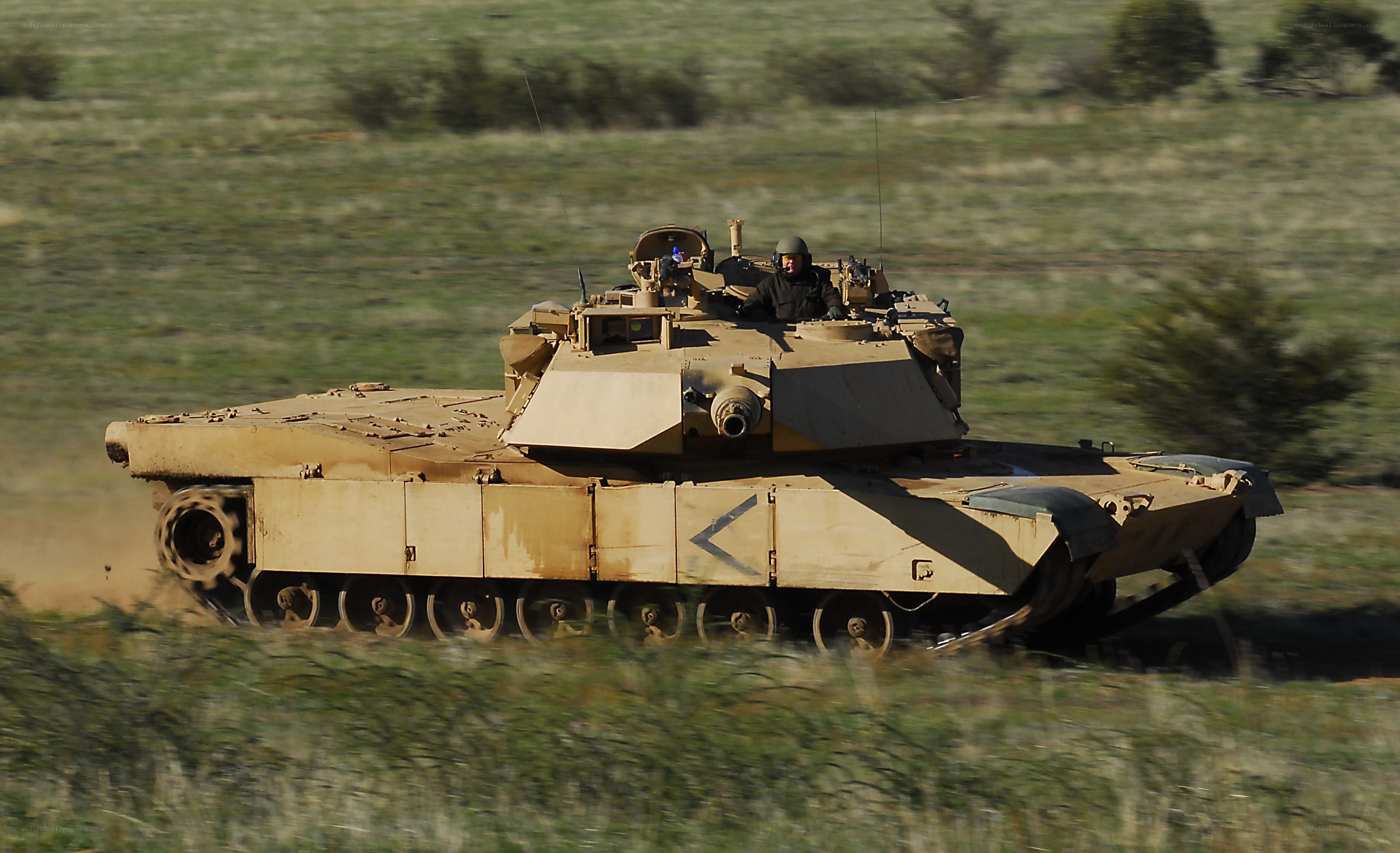 tank in motion on field