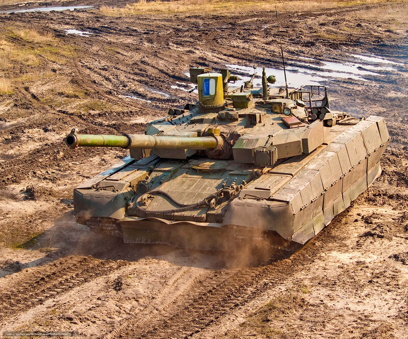Tank in Muddy Field — Brown, Dramatic, Afternoon