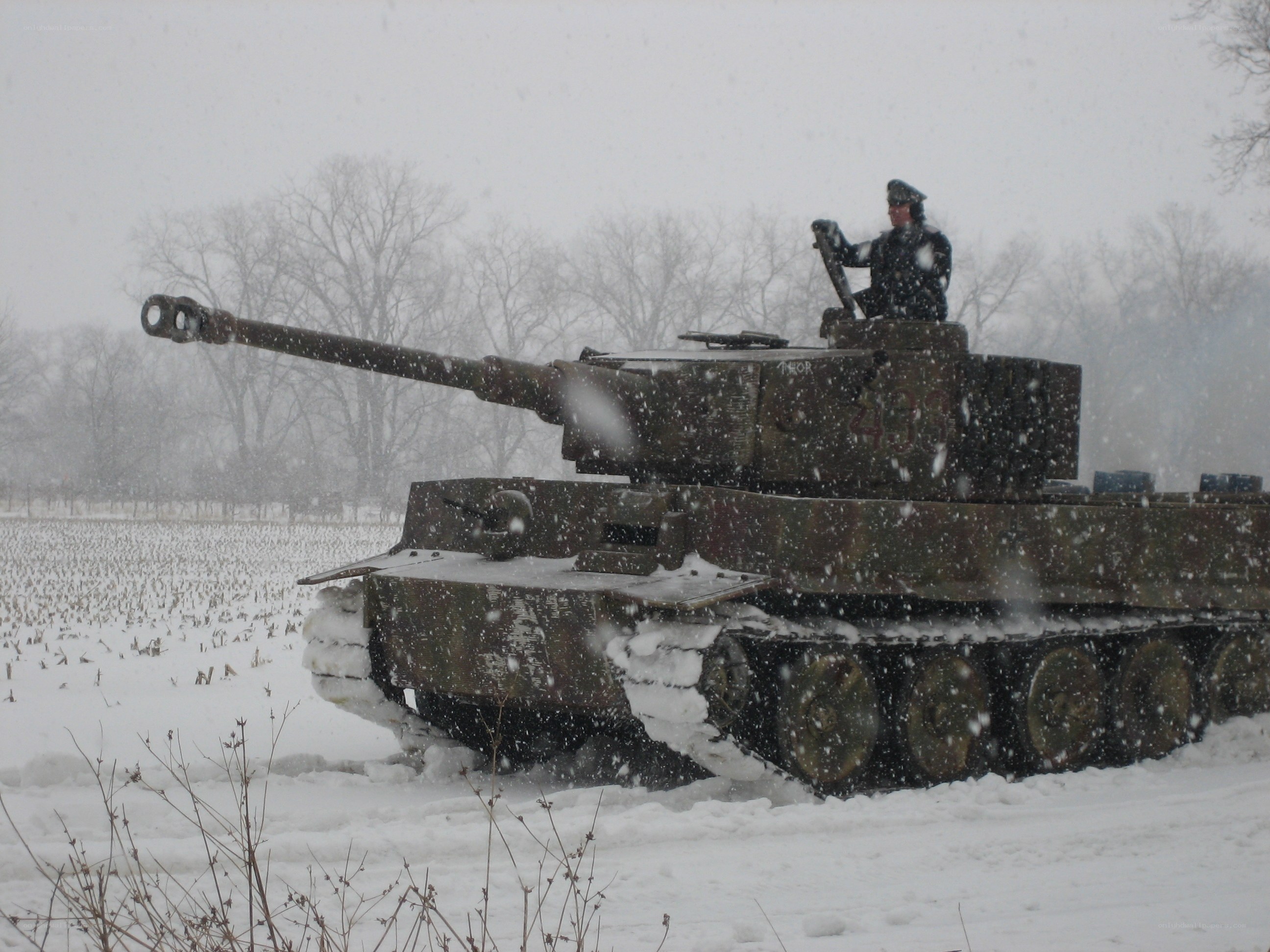 Tank in snowy field
