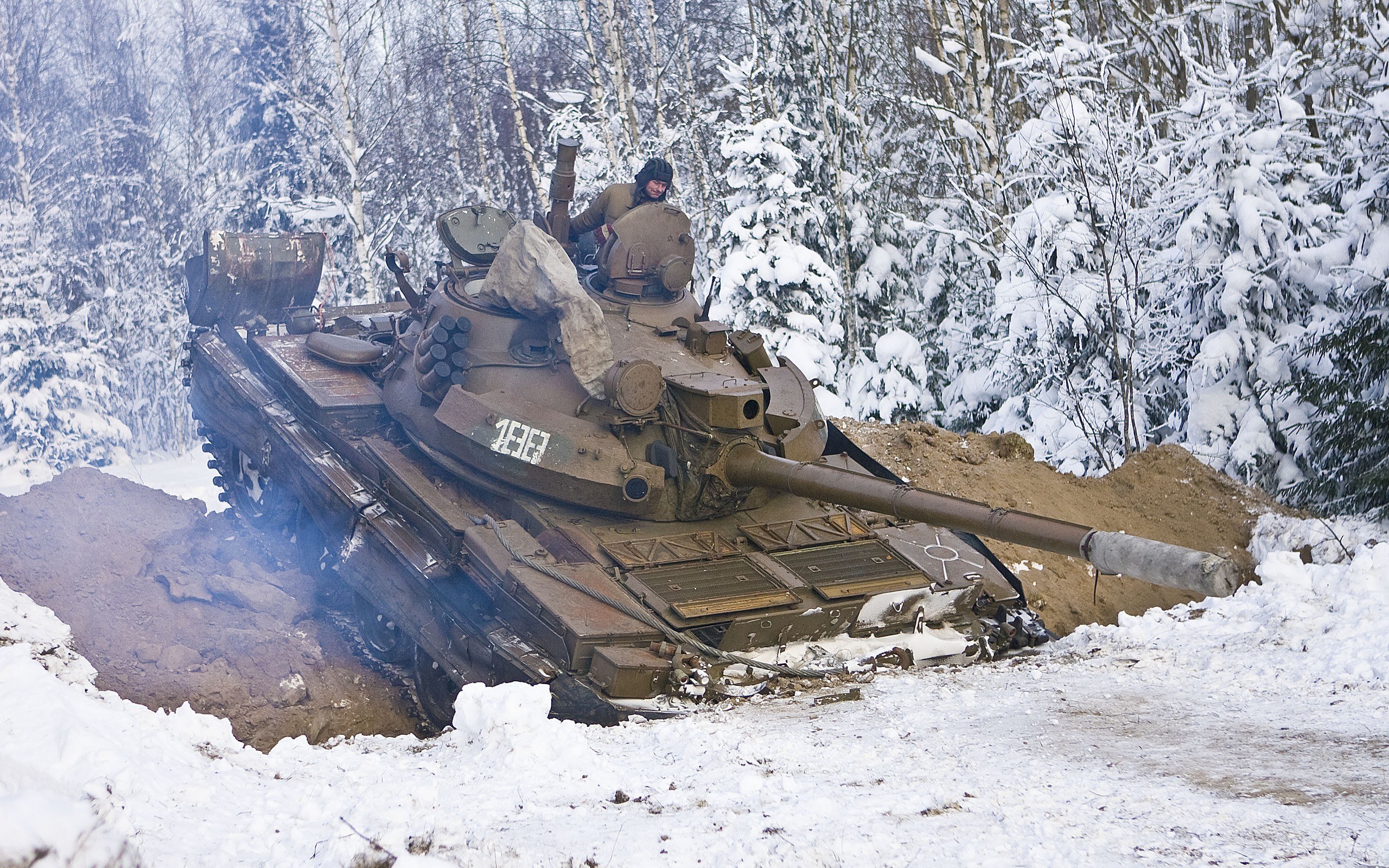 Tank in snowy forest