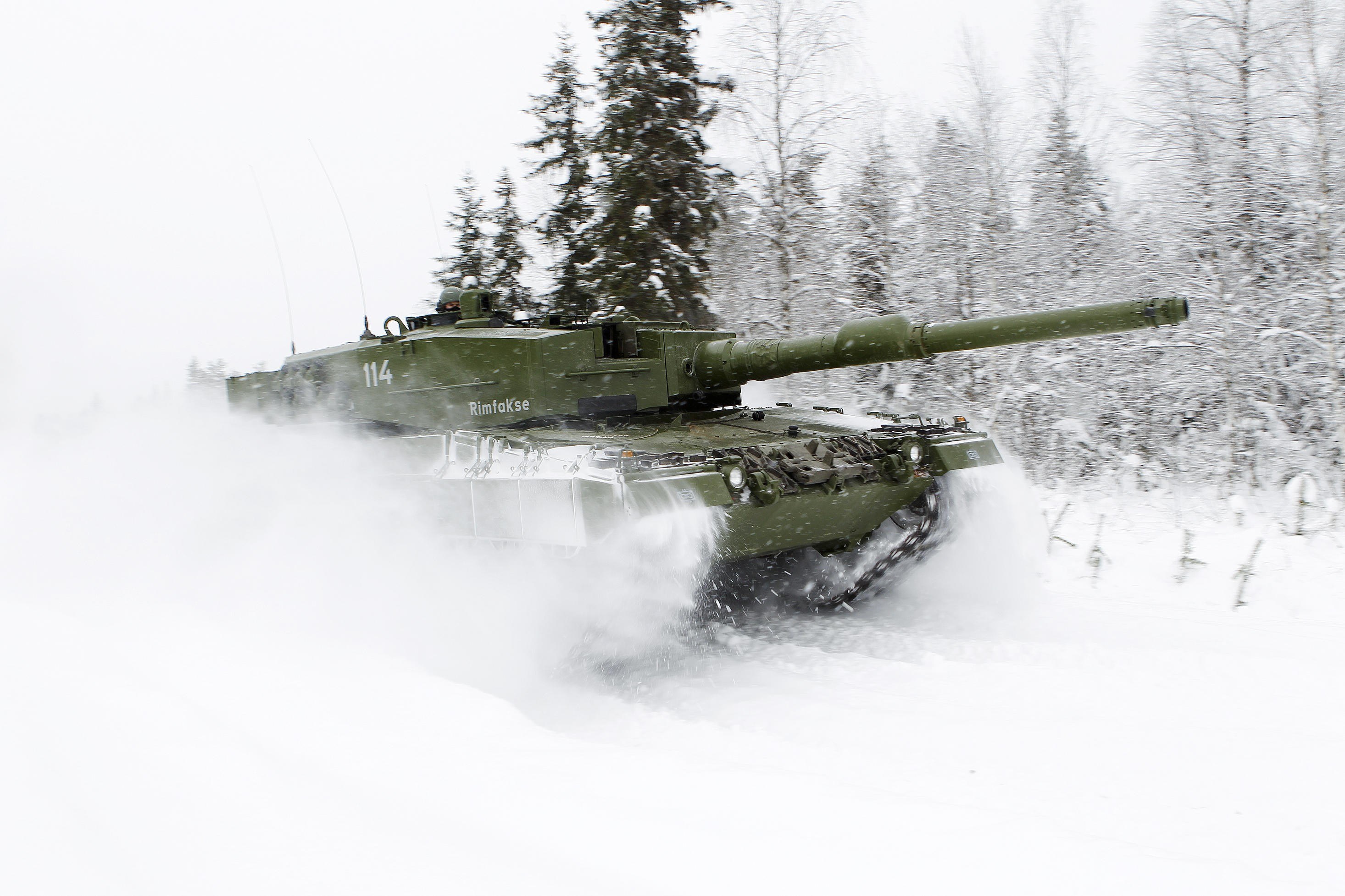 Tank in snowy forest