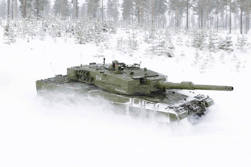 Tank in snowy forest