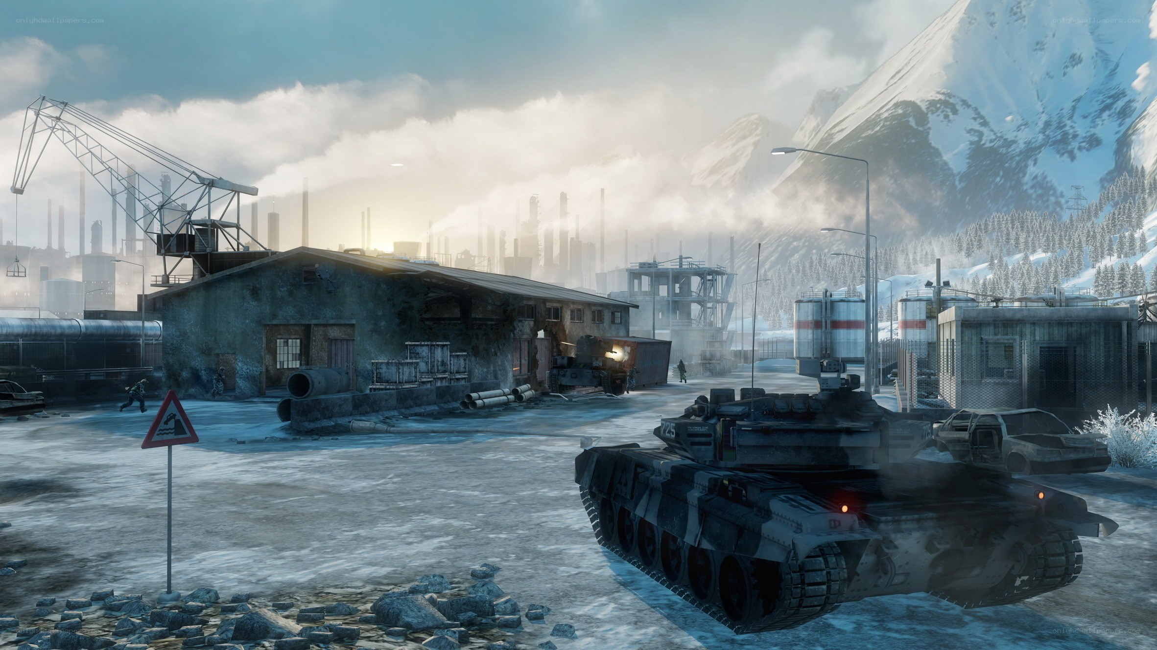 tank in snowy industrial zone