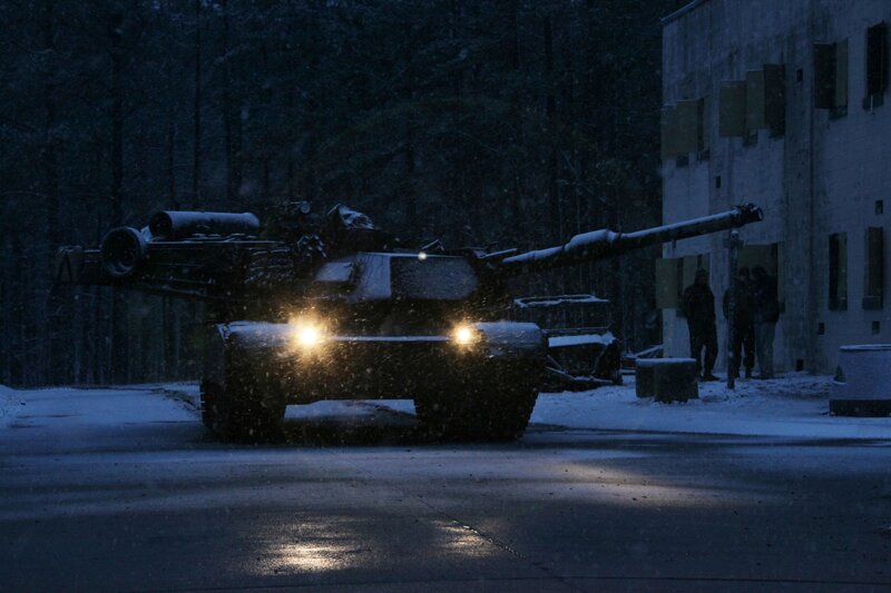 Tank in snowy night scene