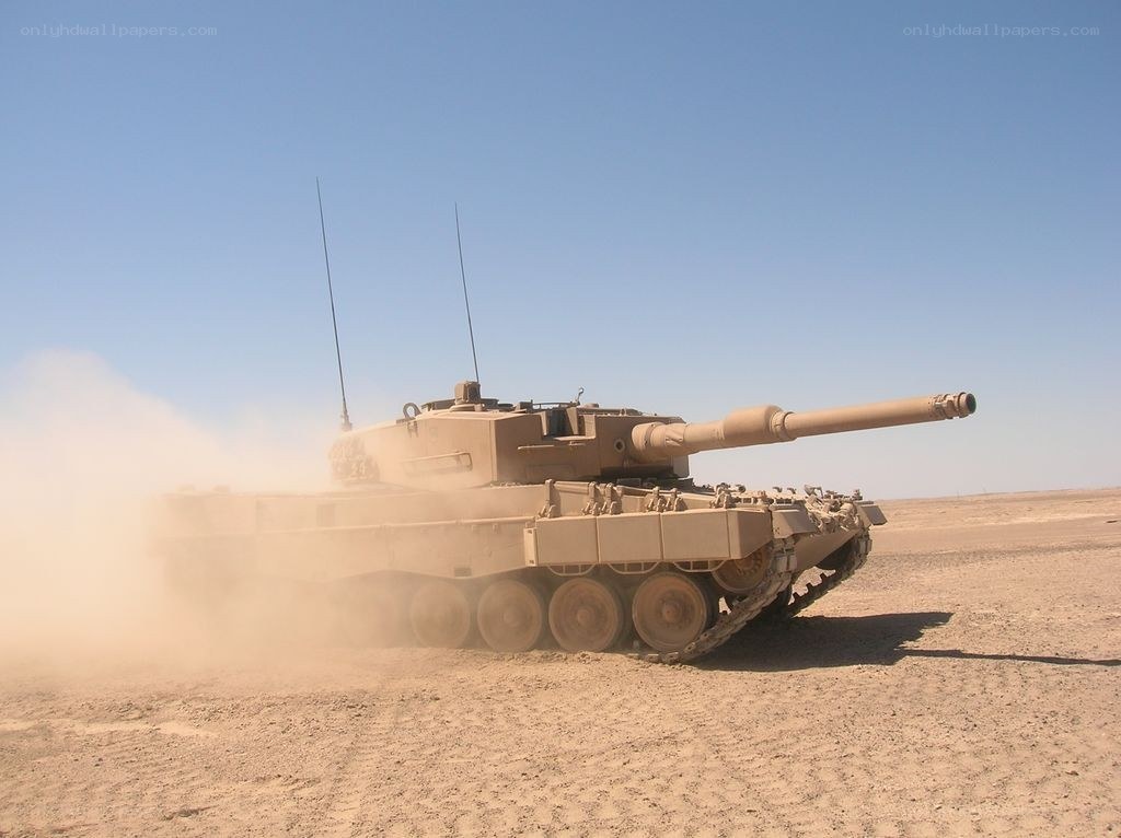 Tank moving in desert