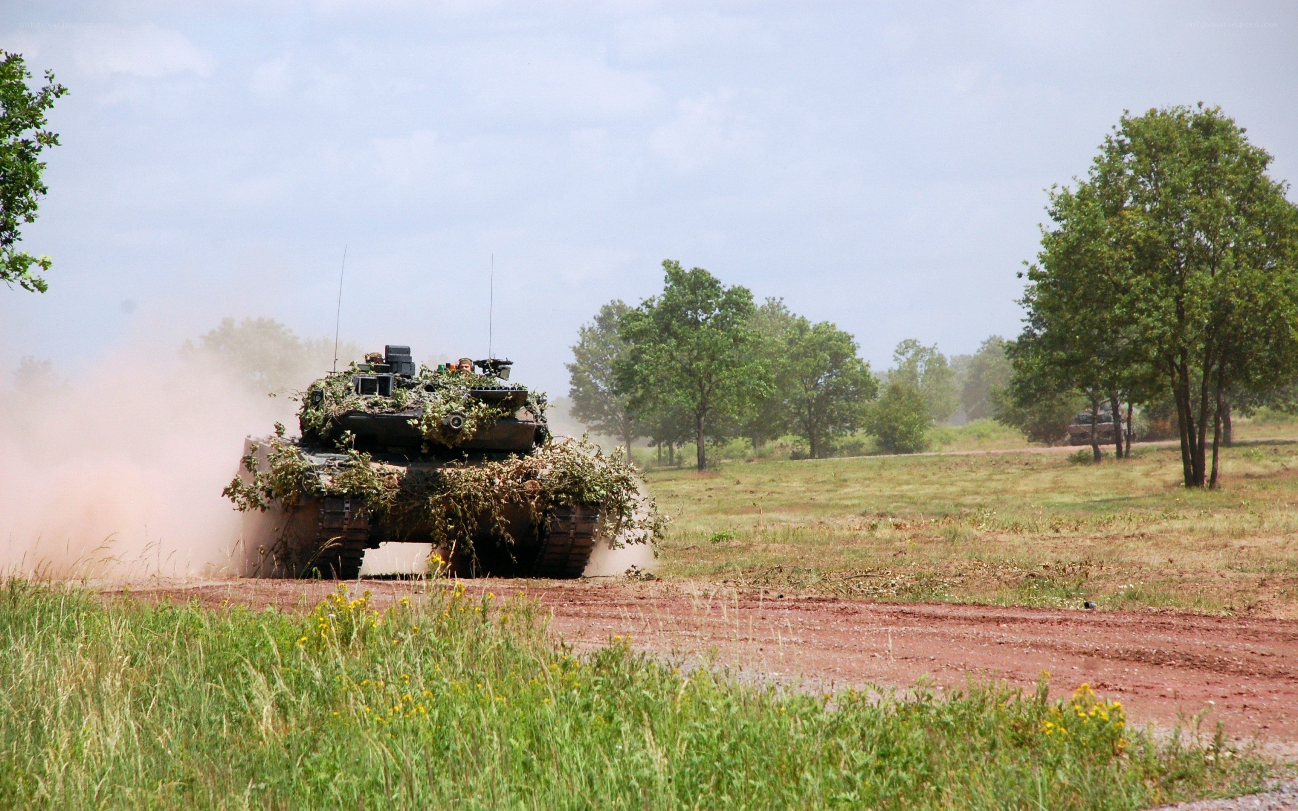 Tank moving on dirt road