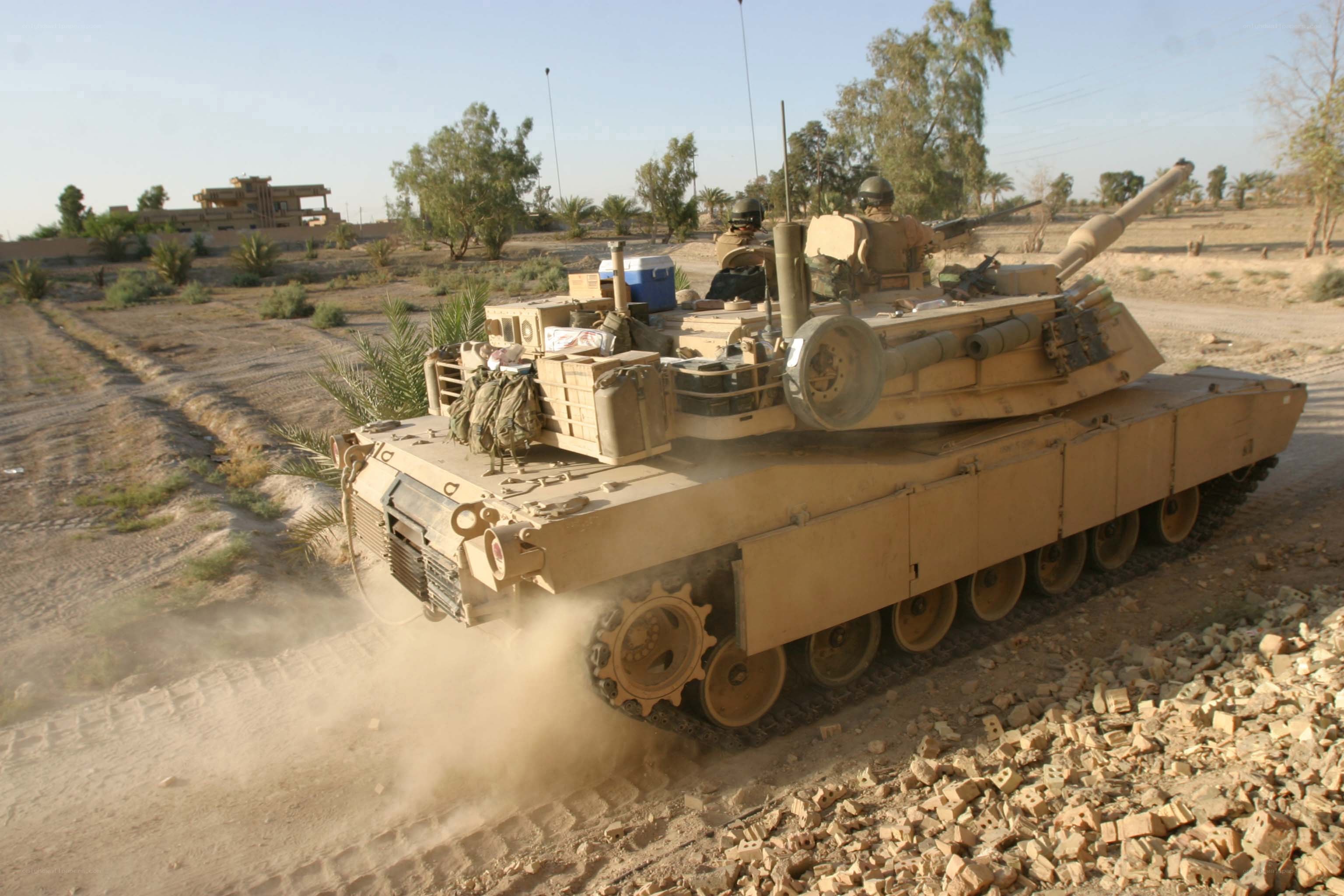 Tank moving on dirt road