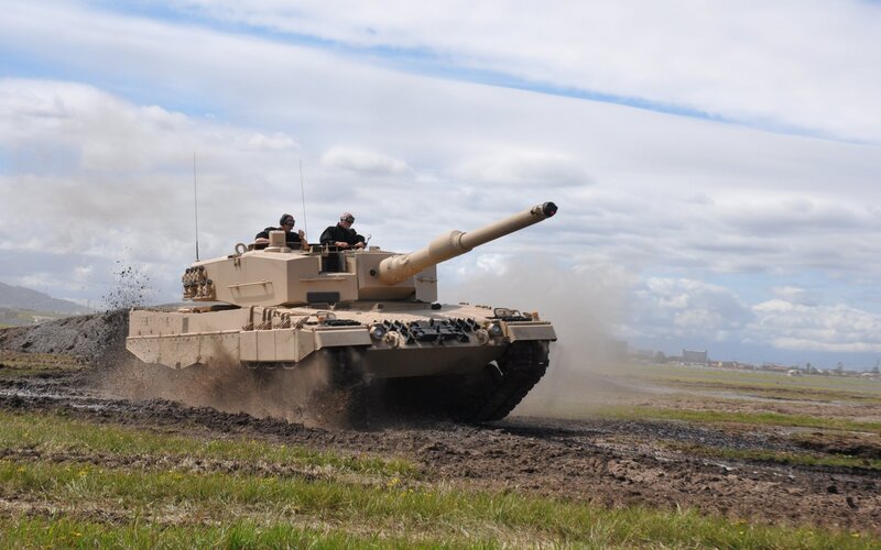 Tank moving on muddy field