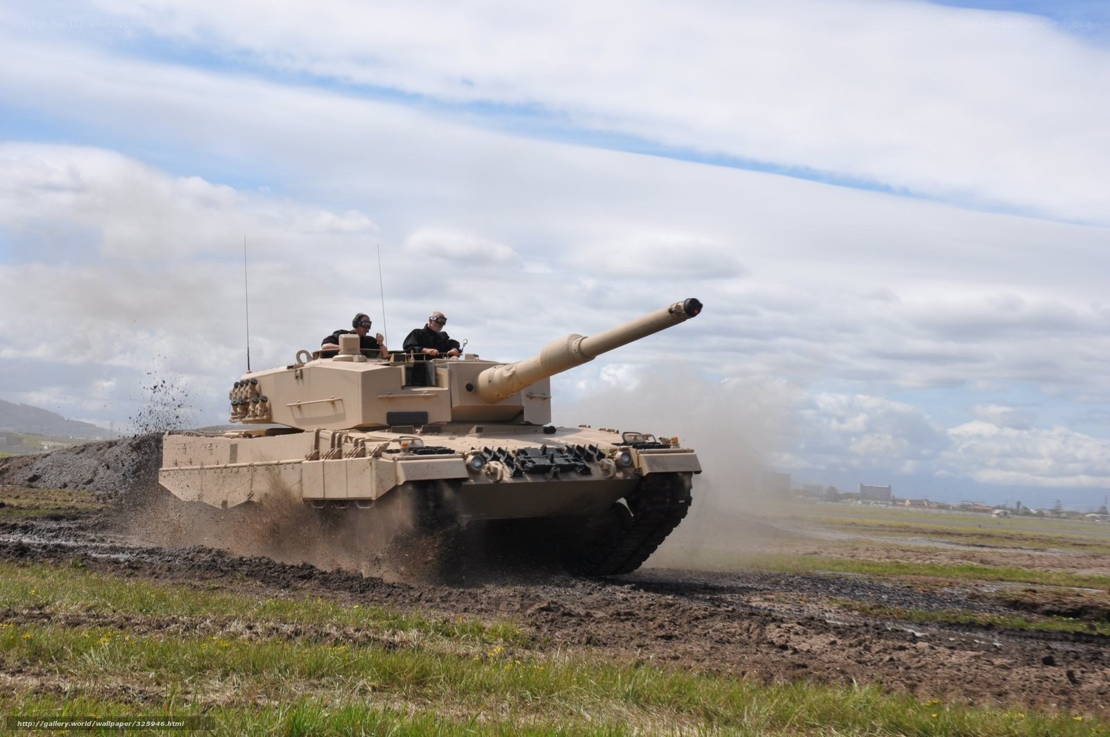 Tank moving on muddy field