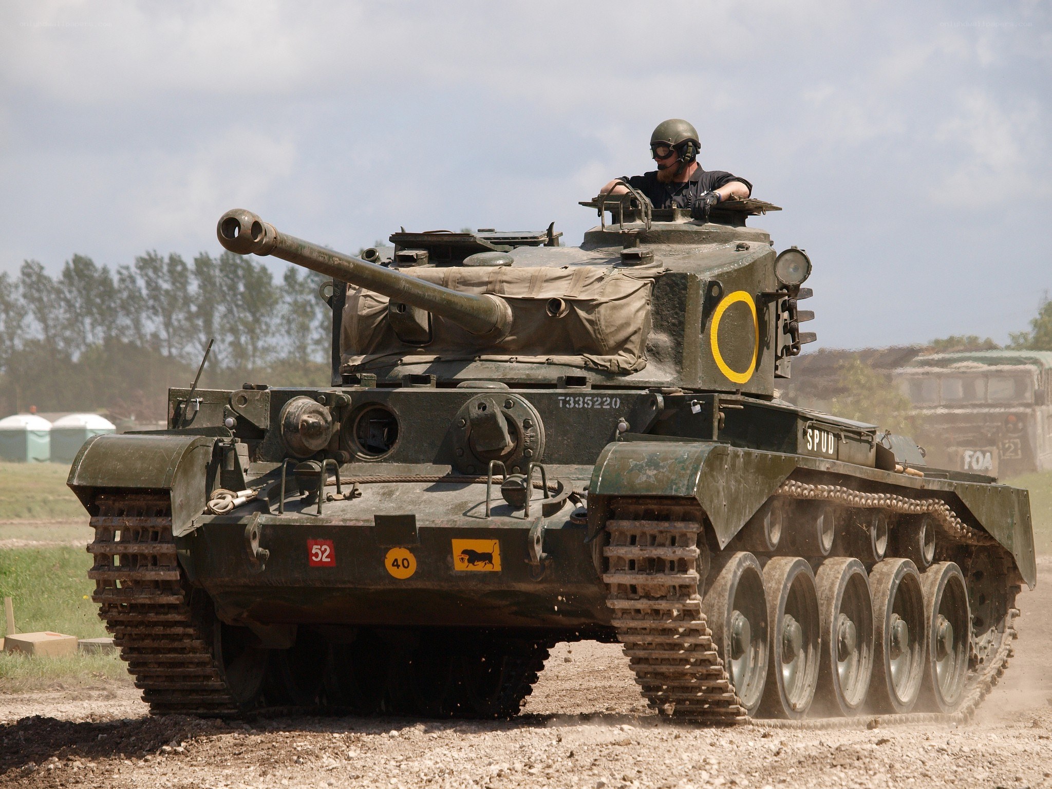 Tank on a dirt field