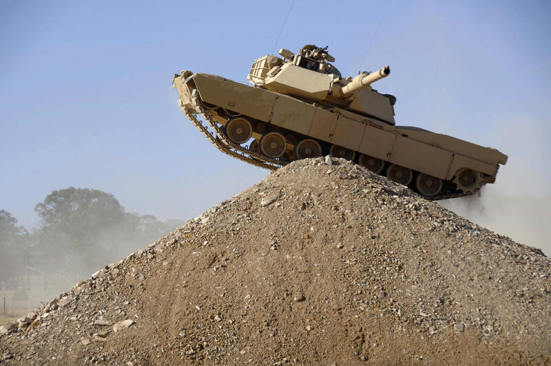 Tank on a Dirt Mound — Brown, Dramatic