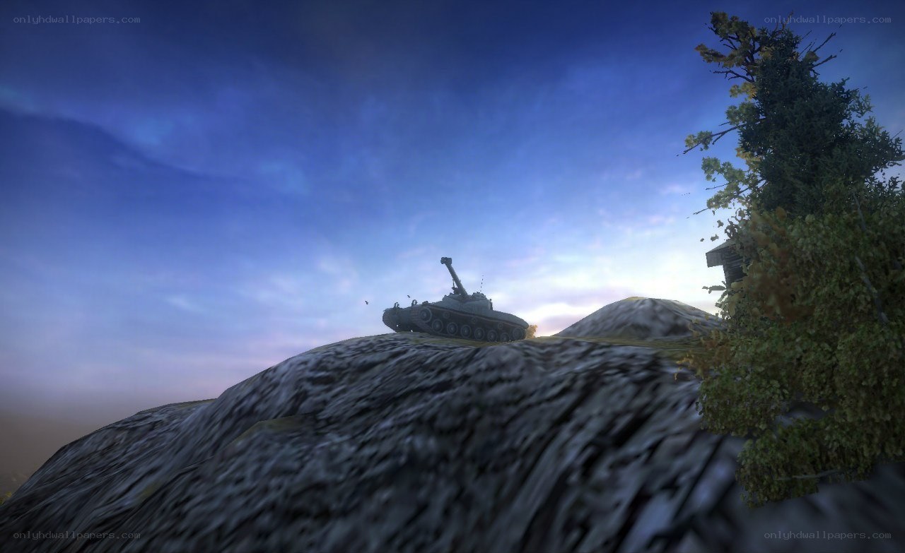 tank on a hill at dusk
