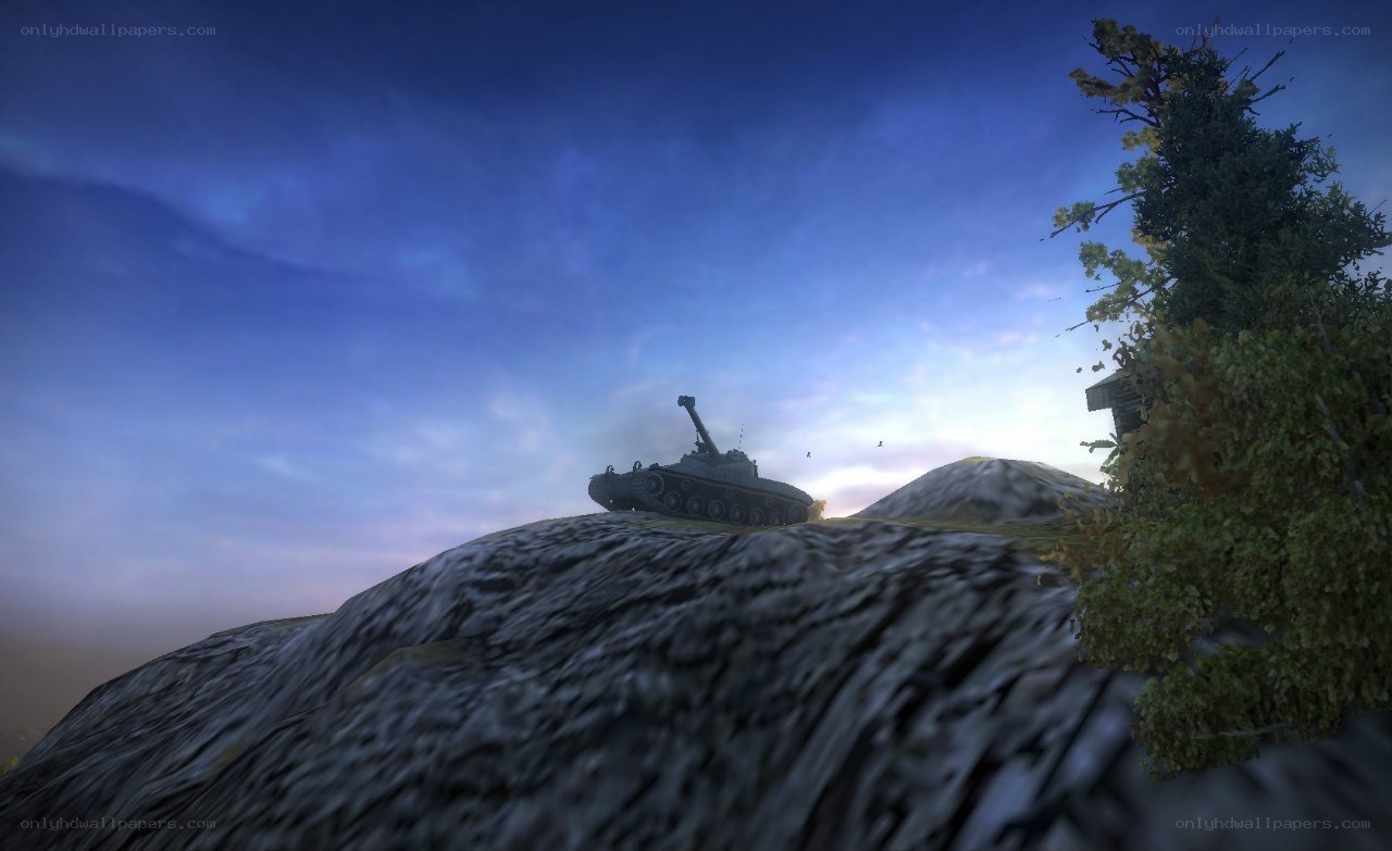 tank on a hill at dusk