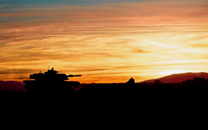 Tank Silhouette at Sunset — Orange, Dramatic