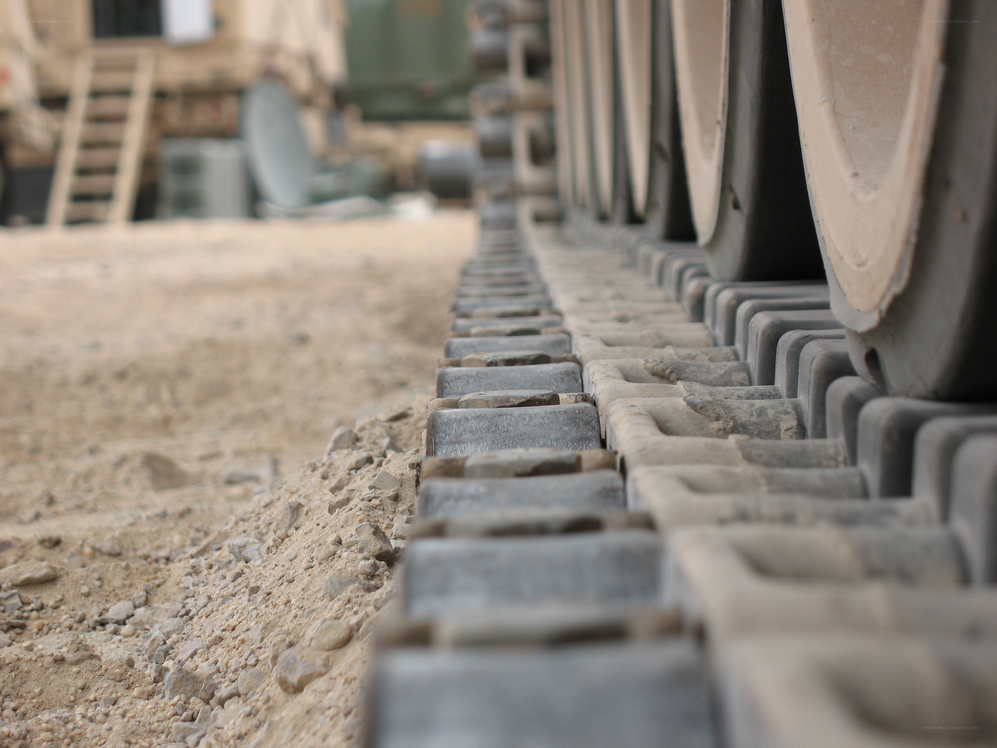 tank track on sandy ground
