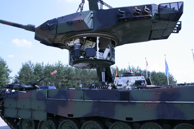 Tank turret being lifted