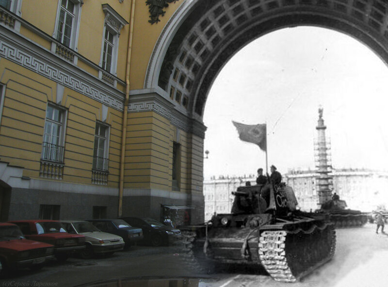 Tank under archway with flag
